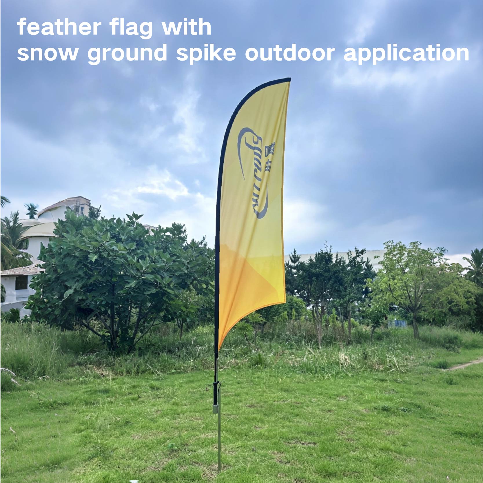 feather flag with snow ground spike application display